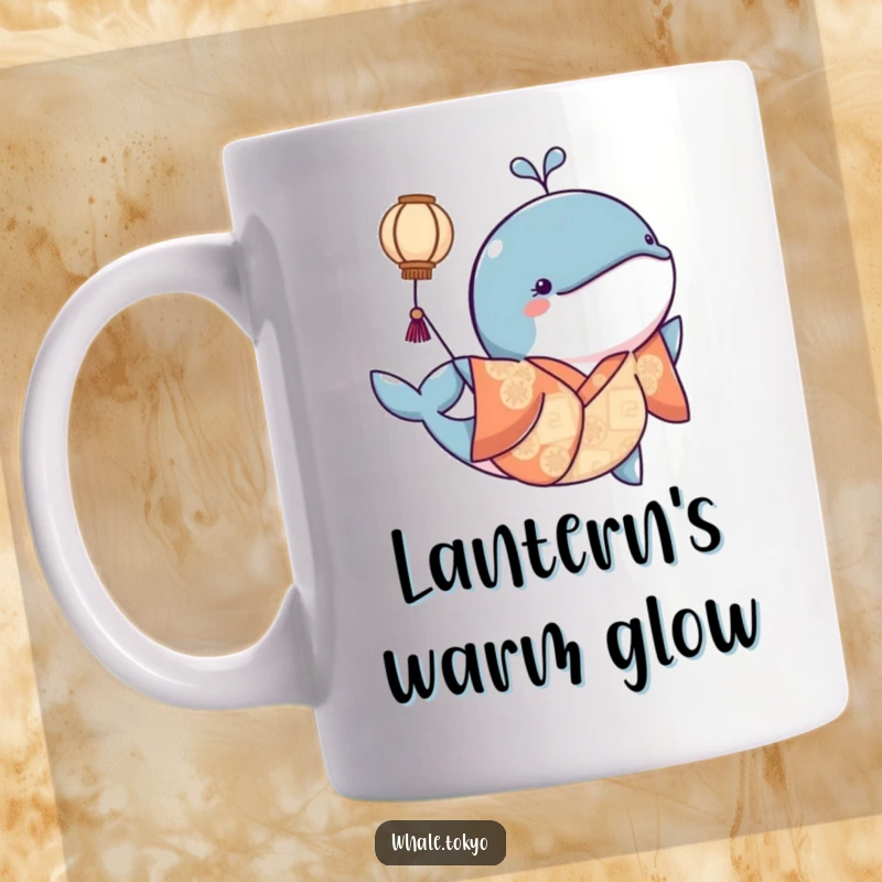 Funny mug showing a whale in a patterned kimono gently nudging a floating lantern, evoking a sense of wonder.